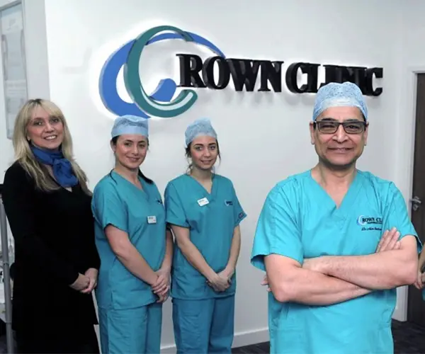 Team members at Crown Clinic reviewing patient information